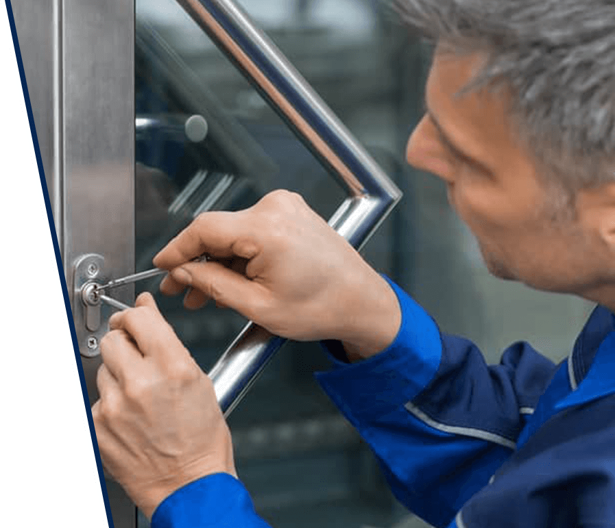 Locksmith repairing a door lock